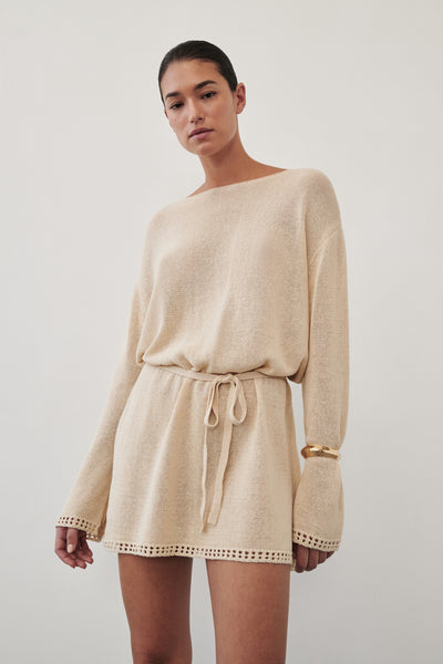 Aude wearing TARI NATURAL KNIT LONG SLEEVE MINI DRESS