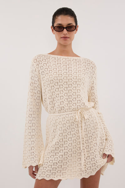 Aude wearing KEIRA NATURAL LONG SLEEVE KNIT MINI DRESS