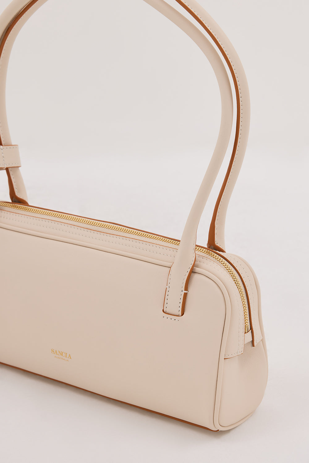 SANCIA THE LUCCA CREAM BAG