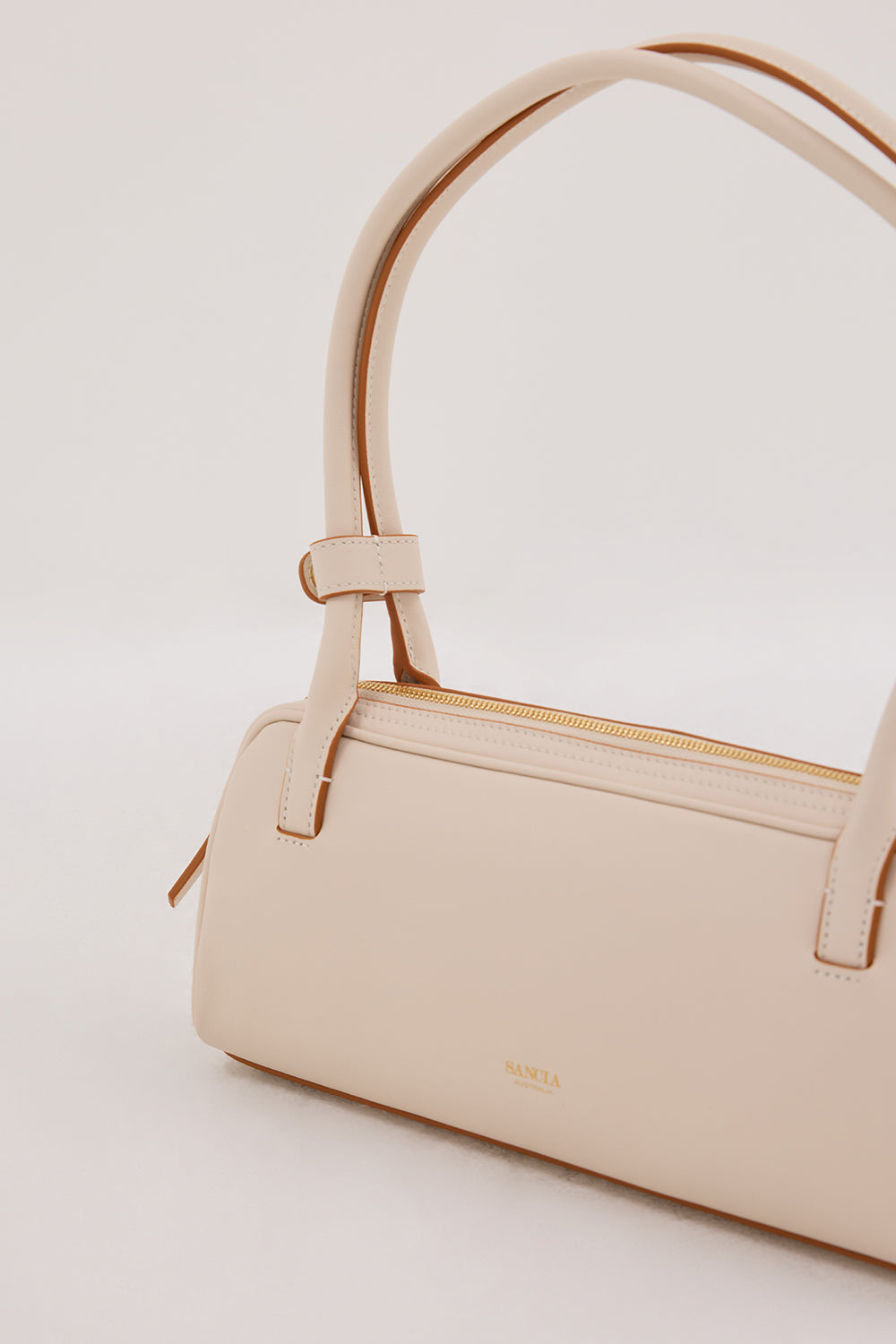 SANCIA THE LUCCA CREAM BAG