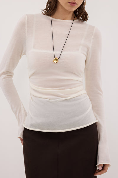Jasmine wearing NICO OFF WHITE MERINO KNIT TOP