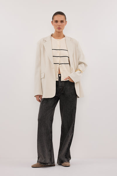 Stas wearing KATE CREAM STRIPE KNIT VEST