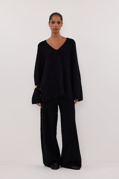 Kristen wearing MAREN BLACK CABLE KNIT JUMPER