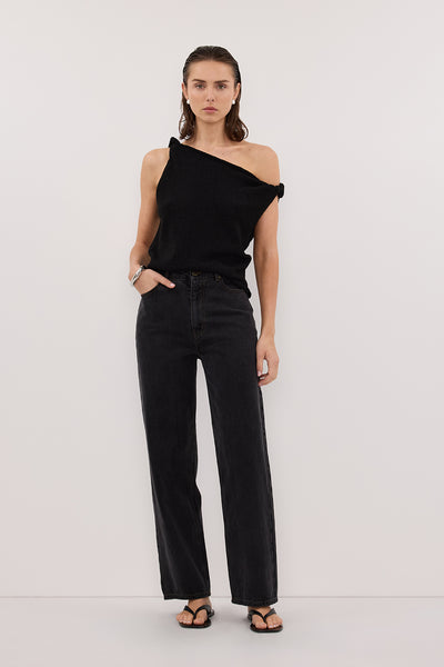 Stas wearing KARA BLACK ASYM KNIT TOP