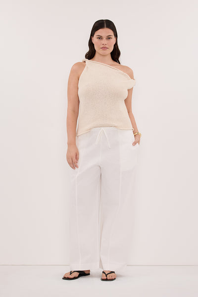 Jasmine wearing KARA SANDSTONE ASYM KNIT TOP