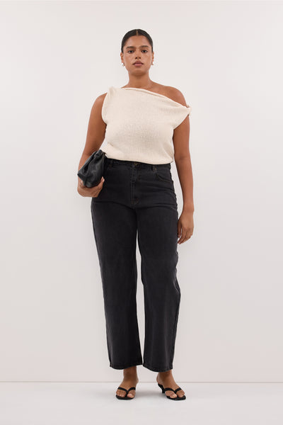 Jasmine wearing KARA SANDSTONE ASYM KNIT TOP