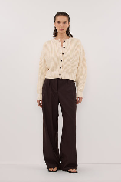 Stas wearing EVALINA SANDSTONE KNIT CARDIGAN