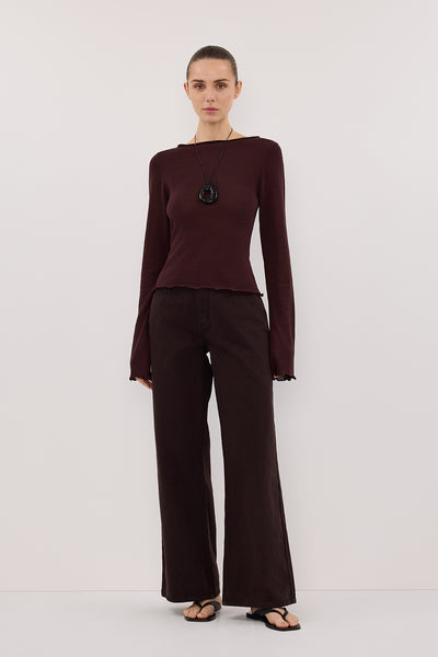 Stas wearing BLAKE PLUM LONG SLEEVE BOAT NECK KNIT TOP