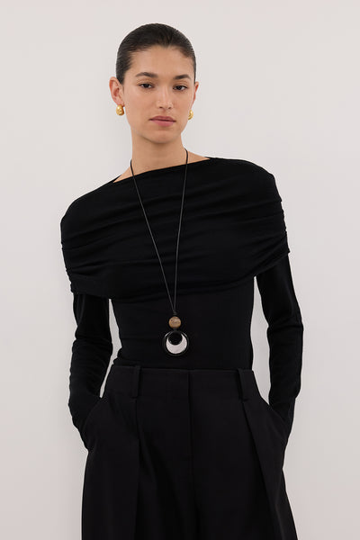 Casey wearing IVY BLACK MERINO LONG SLEEVE TOP