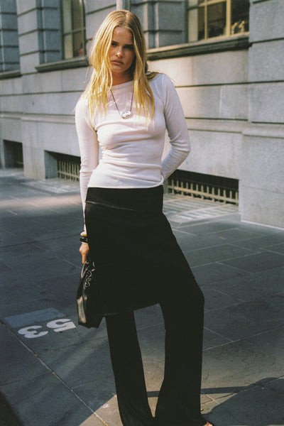 Zoe wearing IVY OFF WHITE MERINO LONG SLEEVE TOP