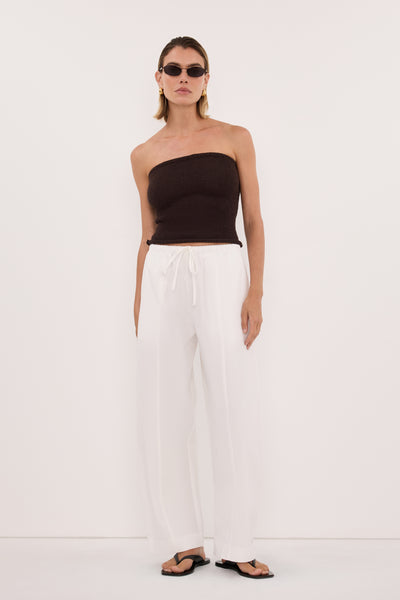 Joanna wearing KARA CHOC STRAPLESS BANDEAU KNIT TOP
