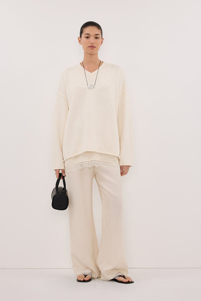 Aude wearing FLINT CREAM V NECK KNIT JUMPER