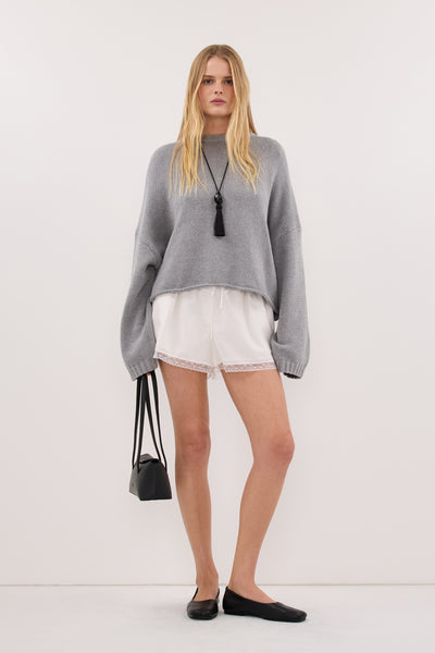 Zoe wearing BAY GREY MARLE KNIT JUMPER