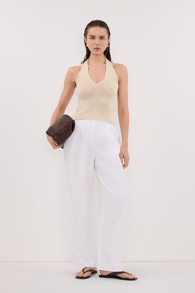 Stas wearing DINA NATURAL SLEEVELESS HALTER KNIT TOP