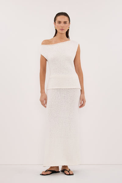 Jasmine wearing DINA OFF WHITE COTTON ASYM KNIT TOP