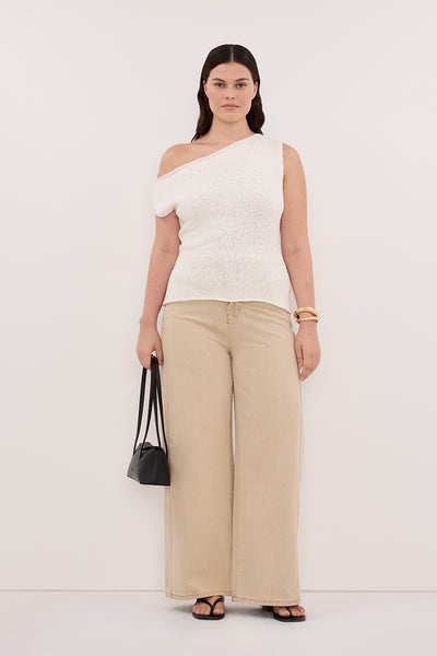 Stas wearing DINA OFF WHITE COTTON ASYM KNIT TOP