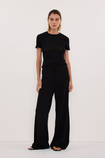 Joanna wearing DUKE BLACK MERINO KNIT BABY TEE