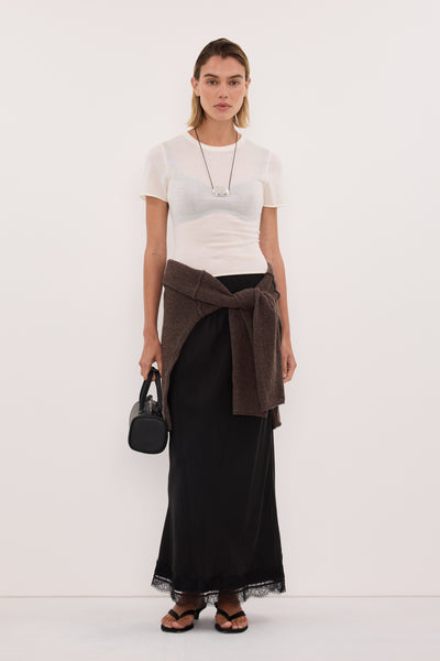 Joanna wearing DUKE OFF WHITE MERINO KNIT BABY TEE