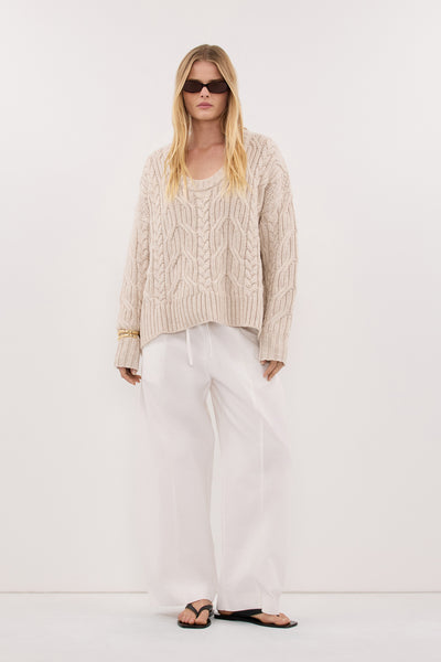 Zoe wearing ROSE CHALK CABLE KNIT SWEATER