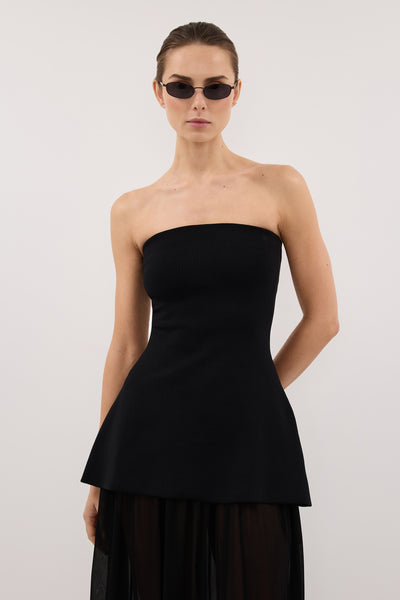 Stas wearing COCO BLACK LONGLINE BANDEAU KNIT TOP