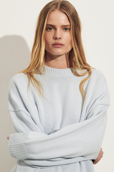Zoe wearing MILA DUSTY BLUE CREW NECK KNIT JUMPER