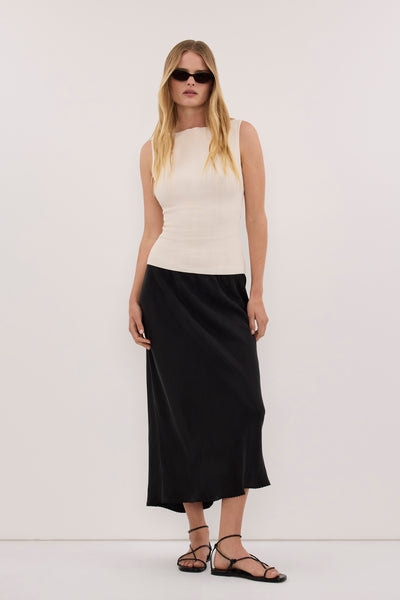 Zoe wearing DOVE MILK SLEEVELESS RIBBED KNIT TANK