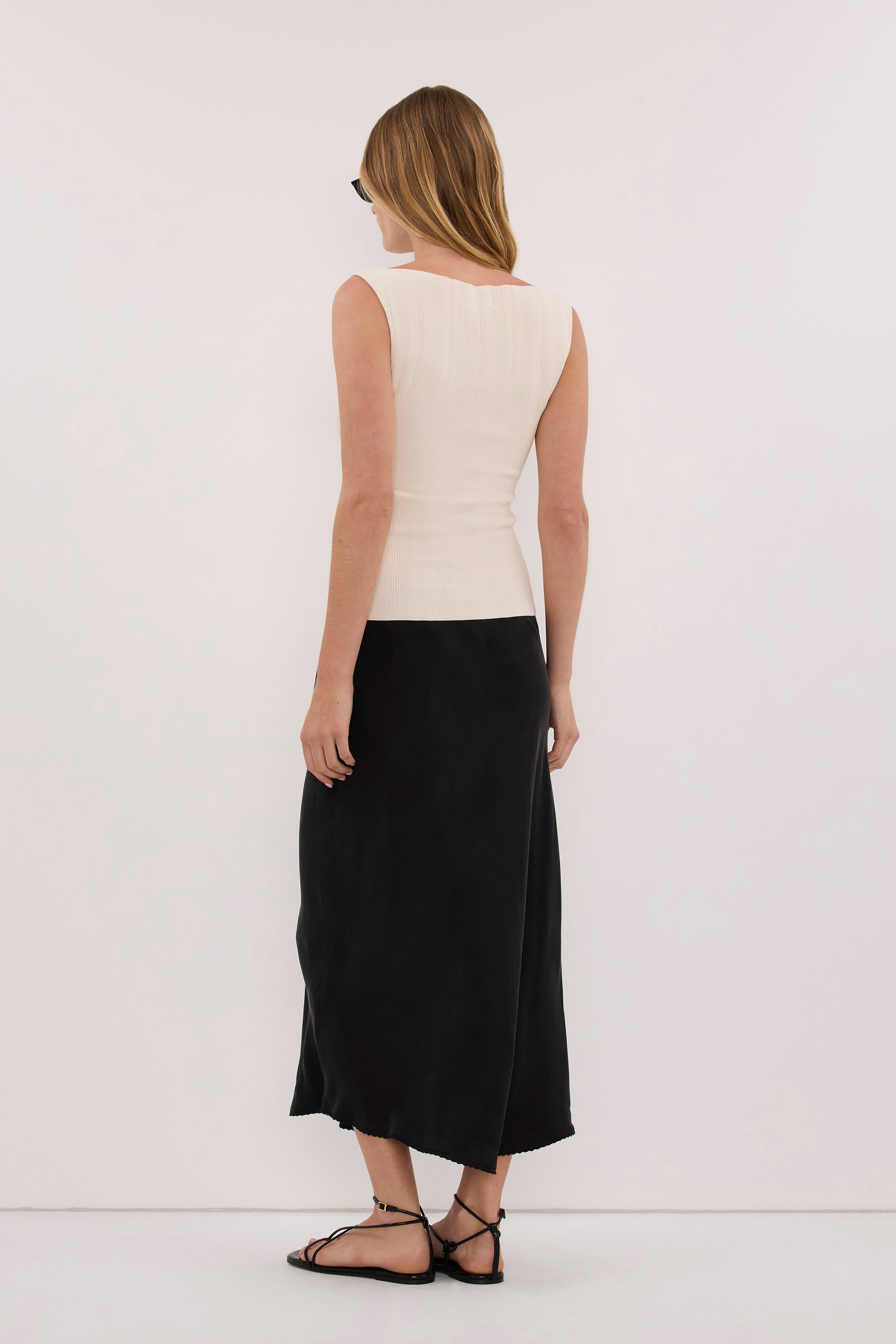 DOVE MILK SLEEVELESS RIBBED KNIT TANK