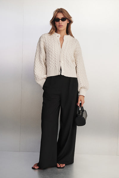 Stas wearing CARMEN IVORY CABLE KNIT CARDIGAN