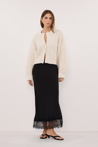 Yulia wearing CARMEN IVORY CABLE KNIT CARDIGAN