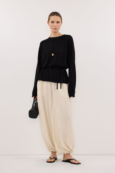 Stas wearing DUKE BLACK TIE MERINO KNIT TOP