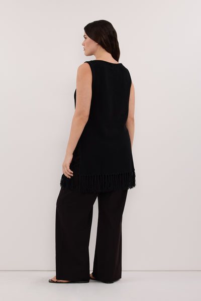 Jasmine wearing BENETTE BLACK FRINGE TUNIC TOP