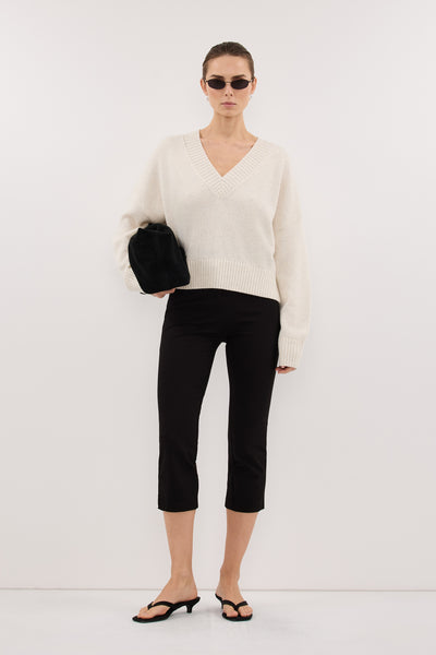 Stas wearing ZELLA IVORY V NECK KNIT JUMPER