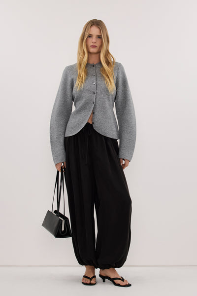 Zoe wearing ELIZA GREY MARLE CINCHED CARDIGAN