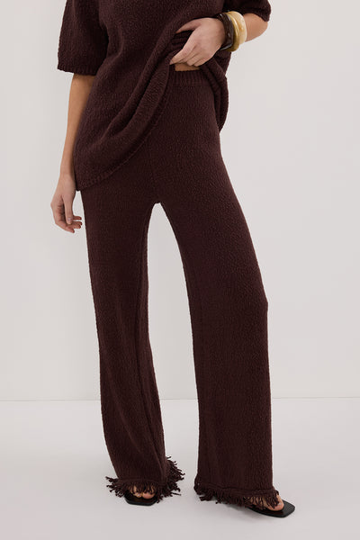 Elena wearing SUE CHOC FRINGE KNIT PANT