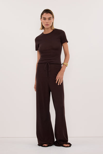 Joanna wearing DUKE BITTER CHOC MERINO KNIT PANTS