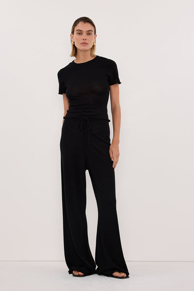 Joanna wearing DUKE BLACK MERINO KNIT PANTS